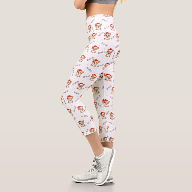 Corgis in Weihnachtsmannmützen Weihnachtsmuster Capri Leggings (Links)