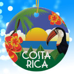 Costa Rica Vintage Stilbilder Keramik Ornament<br><div class="desc">Costa Rica Illustration nach dem Vintage Reisestil Plakate der Vergangenheit modelliert. Das tropische Bild in lebhaften Farben ist mit einem Sonnenuntergang über dem Ozean,  einer Palme,  Blume an Hibisken und einem Toucan ausgestattet. Es ist ein großartiger Vorzug für eine Reise oder Kreuzfahrt nach Costa Rica.</div>