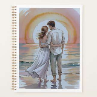 Couple on the beach at sunset planer