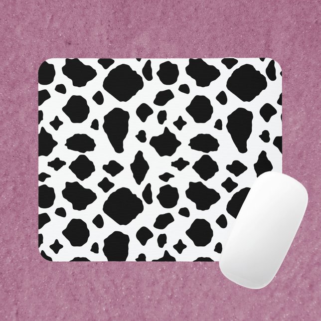 Cow Print Black and White Mousepad (A mouse pad with a black and white cow print pattern.)