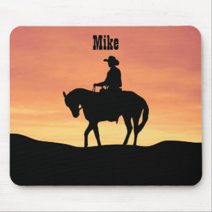 Cowboy auf einem Pferd bei Sonnenuntergang Mousepad