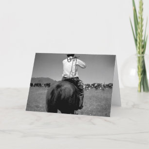 Cowboy auf einem Pferd mit zwei Marken Karte