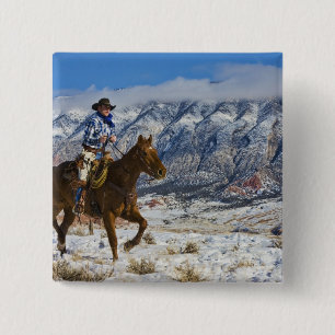 Cowboy auf Pferd mit Lederschäften Button