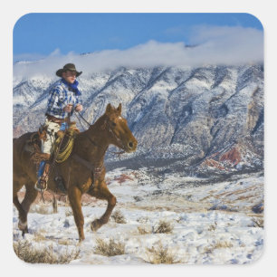 Cowboy auf Pferd mit Lederschäften Quadratischer Aufkleber