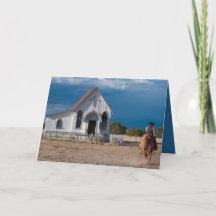 Cowboy, der zur Weihnachtskarte der Kirche fährt