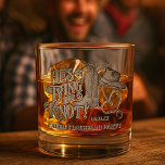 Cowboy Hat Bachelor Party He's Tying the Knot Whiskyglas<br><div class="desc">Let the celebration begin with these fun bachelor party rocks glasses. The fun western themed design features a woodcut word art graphic reading "He's Tying the Knot!" with a cowboy boot, hat and lasso or rope forming a heart shape. There is space for his name and the date of the...</div>