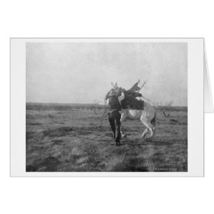 Cowboy "Red Saunders" Saddles a Bronco