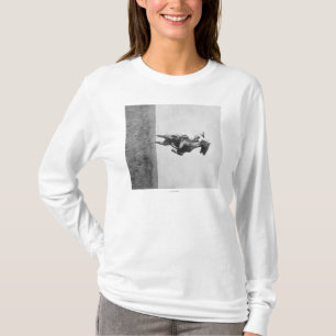 Cowboy reitet das wilde Pferd, das auf seine Hing T-Shirt