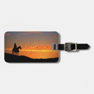 Cowboy und Pferd im Sonnenuntergang Gepäckanhänger