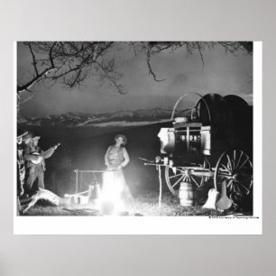Cowboys, die um ein Lagerfeuer spielen und singen Poster