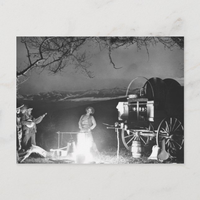 Cowboys spielen und singen um ein Lagerfeuer Postkarte (Vorderseite)