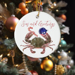 Crab Christmas Watercolor Crustacean Keramik Ornament<br><div class="desc">Dieses Design kann in dem Bereich personalisiert werden, der durch das Ändern des Fotos und/oder Textes zur Verfügung gestellt wird. Sie können auch angepasst werden, indem Sie auf Vorlage personalisieren klicken und dann auf die Schaltfläche klicken, um weitere Optionen anzupassen, um die Hintergrundfarbe zu löschen oder zu ändern, Text hinzuzufügen,...</div>