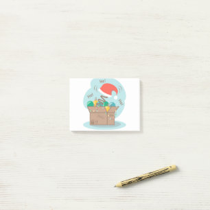Craft box with Christmas decoration and Santa hat Post-it Klebezettel