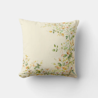Cream-colored pillow with delicate watercolor flor kissen