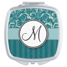 Creme auf aquamarinen Blumenbündeln u. Streifen Taschenspiegel