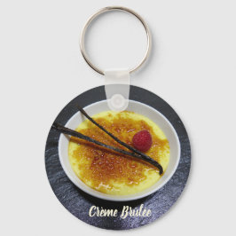 Creme brulae auf Tonschiefer mit Himbeere und Vani Schlüsselanhänger