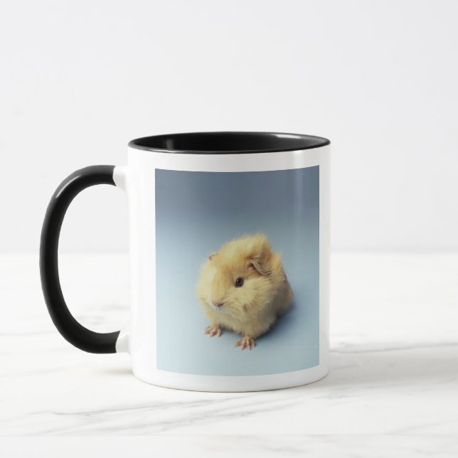 Cremefarbenes Meerschweinchen Tasse (Links)