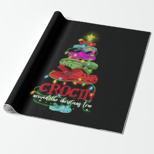 Crocin um das Weihnachtsbaumgeschenk Geschenkpapier