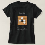 Cry Goishi in Atari Funny Go T-Shirt<br><div class="desc">Zu lernen, das Unvermeidliche zu akzeptieren, ist eine von vielen Lebensstunden, die man aus dem Spiel des Weges lernen kann. Dieser spielerische Go-T - Shirt ist mit einem schwarzen Stein in einer Leiter gefangen, wo der Versuch zu entkommen, zu einem größeren Verlust führt. Je nach Träger und Anlass kann dieses...</div>