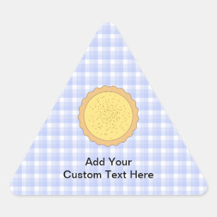 Custard Pie. Gelber Teppich, mit blauem Gingham. Dreieckiger Aufkleber