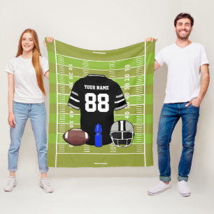 Custom Black and Gray Football Jersey auf Field Fleecedecke