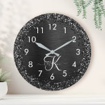 Custom Black Glitter Sparkle Monogram Uhr<br><div class="desc">Easily personalize this trendy elegant clock design featuring pretty black sparkling glitter on a black brushed metallic background.</div>