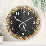 Custom Gold Glitzer Black Sparkgram Monogram Runde Wanduhr<br><div class="desc">Dieses trendige,  elegante Uhrendesign mit hübschem vergoldeten Glitzer auf schwarz gebürstetem metallischem Hintergrund ist einfach zu personalisieren.</div>
