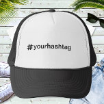 Custom Hashtag Personalisiert Baseball Truckerkappe<br><div class="desc">Fügen Sie einen Hashtag hinzu und erstellen Sie einfach Ihren Hashtag Baseballhut. Klicken Sie auf KENNEN, um die Hintergrundfarbe oder Textfarbe zu ändern. Sie können dieses Design auf anderen Zazzle-Produkten übertragen und an die meisten Zazzle-Produkte anpassen. Sie können auch auf die Schaltfläche CUSTOMIZE klicken, um Details wie Hintergrundfarbe, Text, Schriftart...</div>
