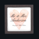 Custom Mr. Coral watercolor heart wedding ring Kiste<br><div class="desc">Custom Mr and Mrs. coral pink watercolor heart wedding keepsake gift box with magnetic lid. Add personalized name of bride and groom / newly weds. Vintage fern symbol background design with stylish script typography. Great for ring bearer, jewelry, party favor and other stuff. Also, Nizza for elegant engagement, Anniversary, bridal...</div>