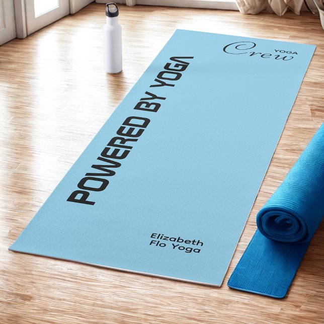 Custom Print Yoga Crew Baby Blue Yogamatte (Baby blue yoga mat on studio floor.)
