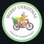 Custom Reindeer Christmas Runder Aufkleber<br><div class="desc">Personalisieren Sie diesen niedlichen Weihnachtsaufkleber mit Ihrem Familiennamen und dekorieren Sie Ihre Geschenke mit diesem niedlichen Rentier auf einem Fahrrad.</div>