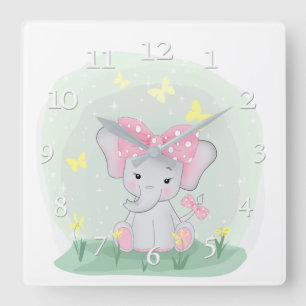Cute baby elephant with a pink bow in a clearing Quadratische Wanduhr