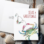Cute Beach Christmas Cards Watercolor Crab Feiertagskarte<br><div class="desc">Send holiday cheer with these watercolor Christmas cards featuring a festive crab tangled in colorful holiday lights in shades of red, green, blue, and turquoise. Perfect for a nautical or coastal holiday theme, these cute Xmas cards capture the spirit of the beach with the playful phrase “Seas and Greetings” in...</div>