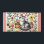 Cute Cat on Floral Quilt Cottagecore Schreibtischunterlage<br><div class="desc">A delightful gray tabby kitten sits sweetly among blooming flowers in this cozy, cottagecore-inspired design. The backdrop features a vibrant patchwork quilt filled with charming geometric patterns, soft pastels, and vintage textures that evoke feelings of warmth and nostalgia. Surrounding the kitten are blooming sunflowers, roses, and daisies, along with cheerful...</div>