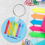 Cute Custom Teacher Crayon Back to School Monogram Schlüsselanhänger<br><div class="desc">A beautiful Teacher Appreciation Week or End of Year gift for a kindergartener to give to their elementary school teacher. Custom made with a name under the cute rainbow of crayons. An adorable keychain for a preschool teacher.</div>