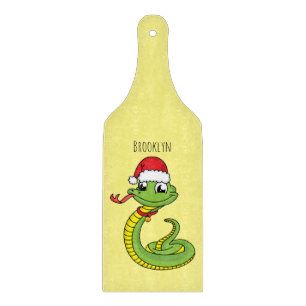 Cute green snake with santa hat cartoon schneidebrett