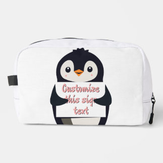 Cute penguin holding a sign for personalized text waschbeutel