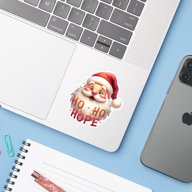 Cute Santa “Ho Ho Hope” Sticker (Laptop mit iPhone)