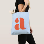 Cute Soft Blue Orange Monogram Retro Lettering<br><div class="desc">This stylish tote bag features your monogram in orange on a soft blue background in retro lettering. Great gift idea!</div>