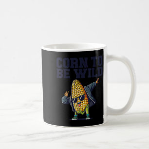 Dabbing Mais zu wilden, lustigen Cob-Bauern über Kaffeetasse