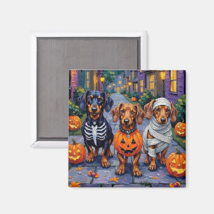 Dachshund-Hunde beim Trick-or-Treat an Halloween Magnet