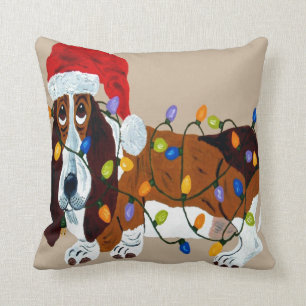 Dachshund verwirrt in den Weihnachtslichtern Kissen