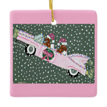 Dachshunde an Weihnachten in einem rosa Cabrio