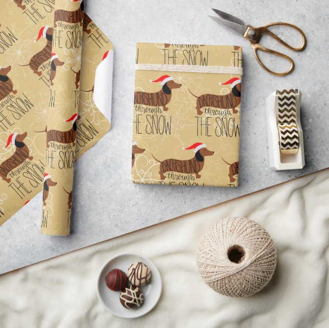 Dackel durch das Schneedeckungspapier Geschenkpapier (Kunsthandwerk)