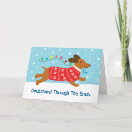 Dackel durch den Schnee-Weihnachtsfeiertag Feiertagskarte