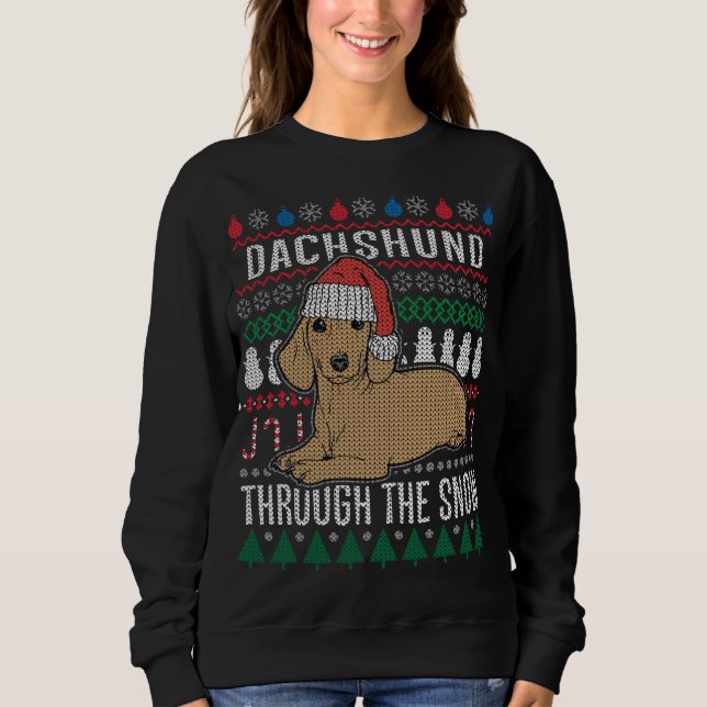 Dackel durch den schneebedeckten Weihnachtssüßer Sweatshirt (Vorderseite)