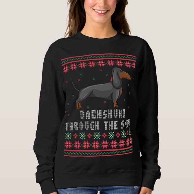 Dackel durch den schneebedeckten Weihnachtssüßer Sweatshirt (Vorderseite)
