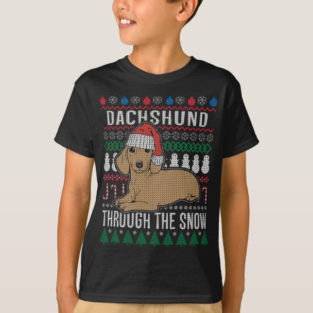 Dackel durch den schneebedeckten Weihnachtssüßer T-Shirt (Vorderseite)