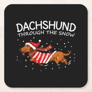Dackel durch den schneewitzigen Hund Weihnachten Rechteckiger Pappuntersetzer