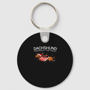 Dackel durch den schneewitzigen Hundeweihnachtskla Schlüsselanhänger